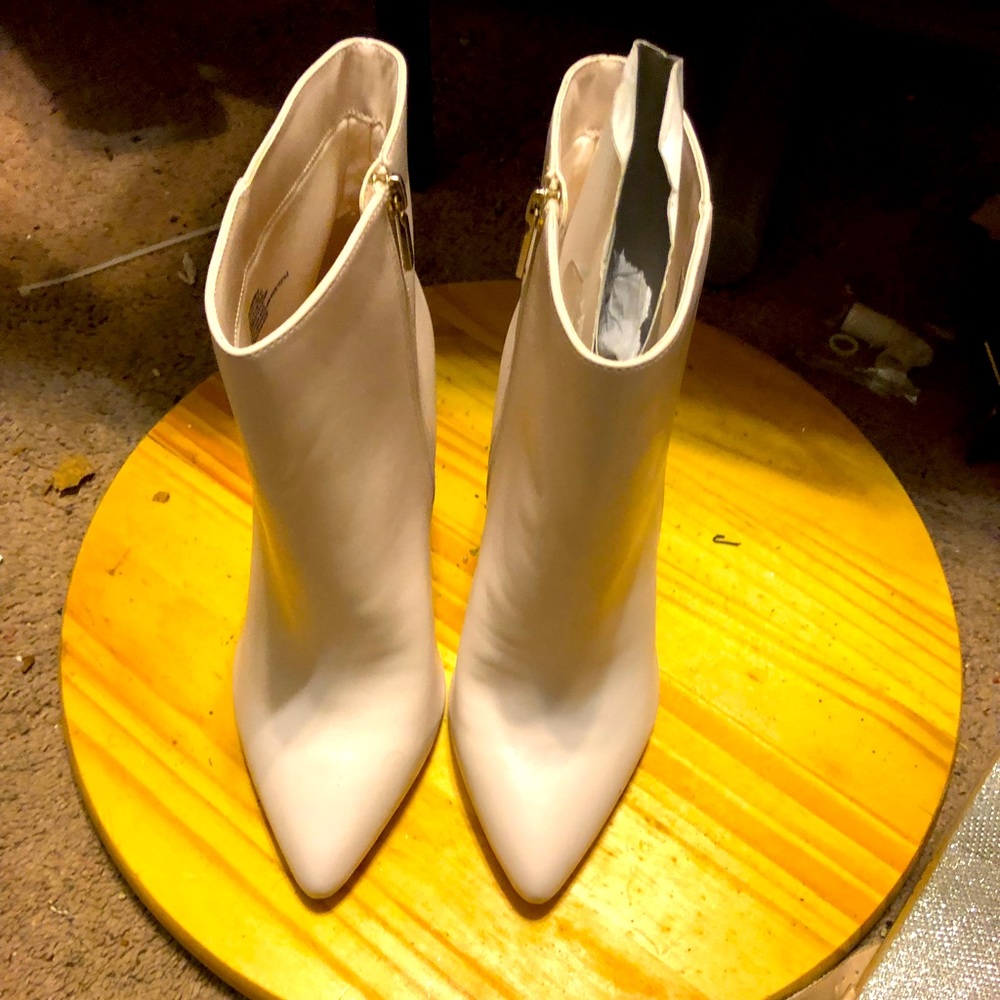 Cream colored low cut boots